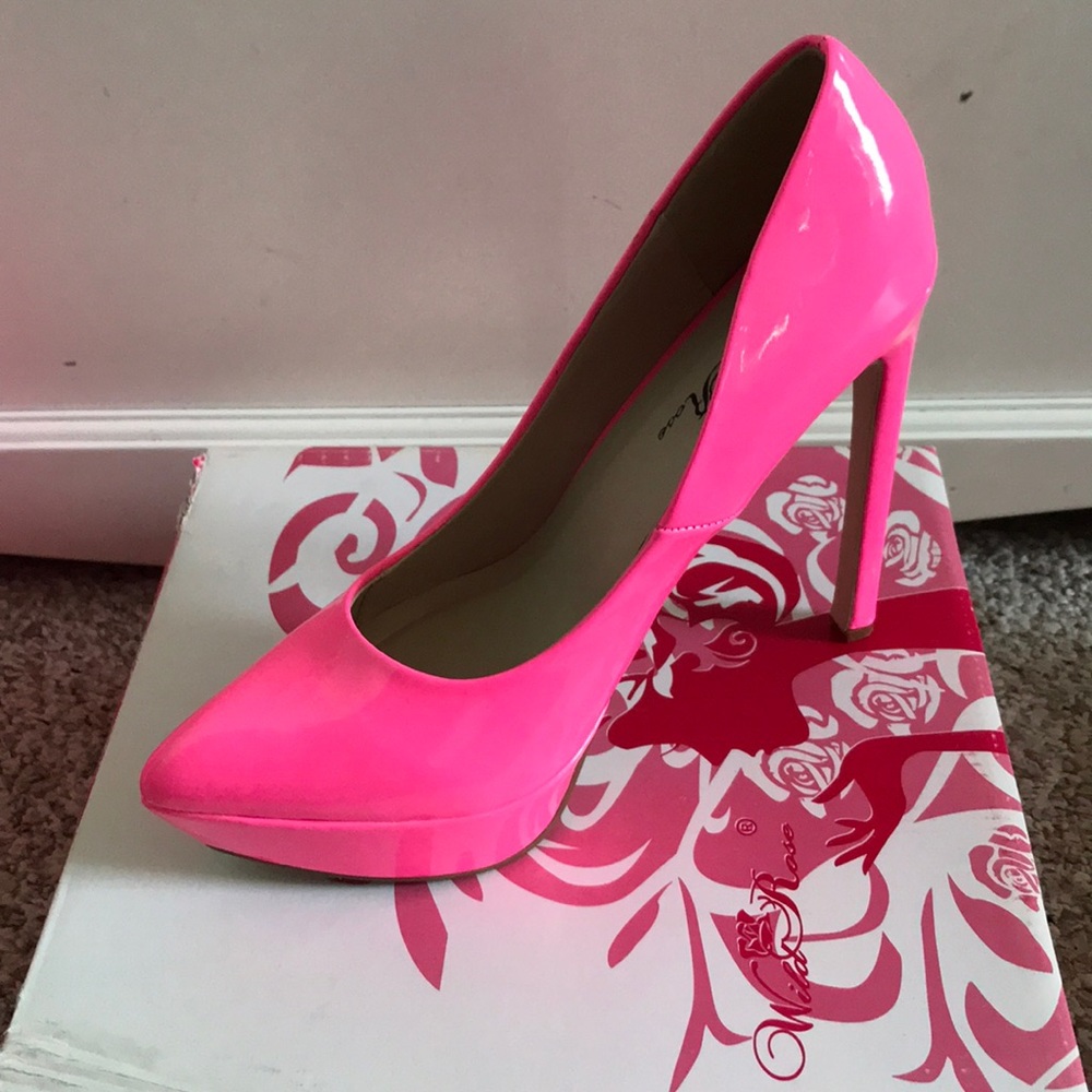 Neon pink point toe heel